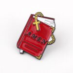 Pin’s chrétien Bible et chapelet – “Amen”